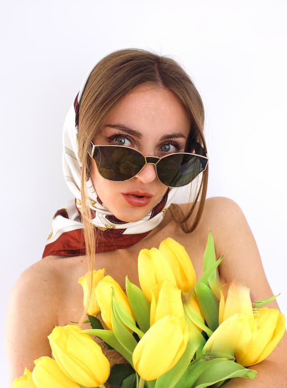 Must de Cratier silk scarf with yellow tulips makeup editorial beauty face