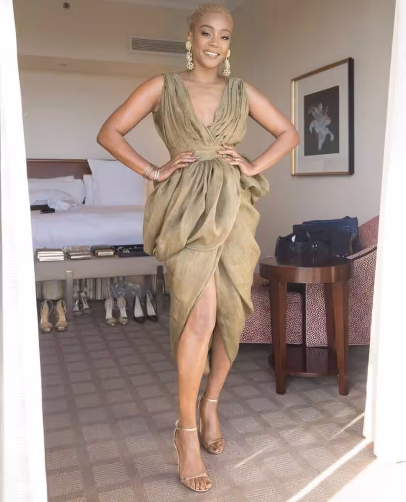 Tiffany Haddish Wowd In Altuzarra Olive Green Draped Linen Dress Vintage Ebony Fashion Fair Earrings and Gold Jimmy Choo Sandals3 1160x1435 1